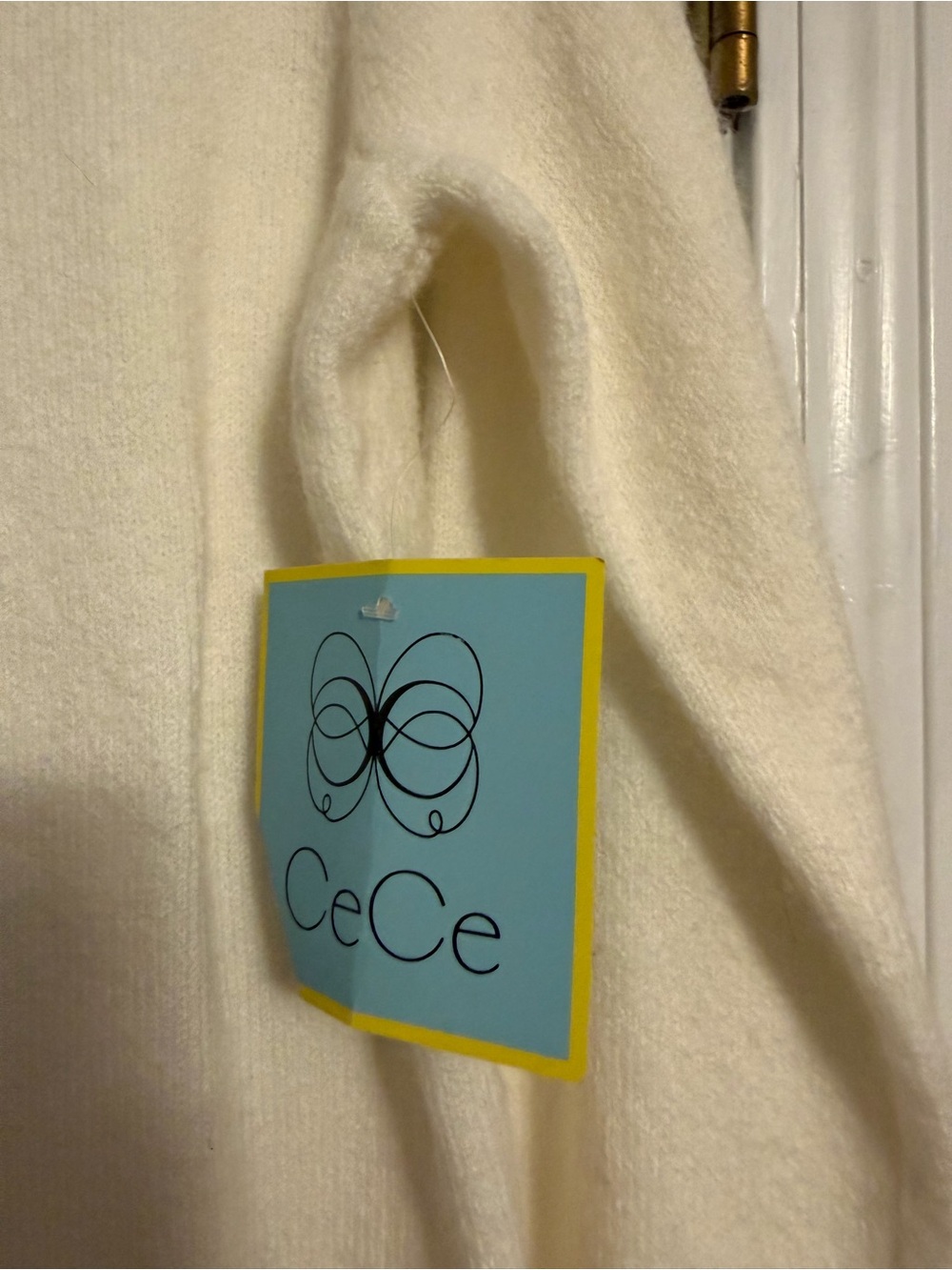 CeCe Cream Crewneck Sweater with Black Bow Accent - Picture 4 of 5